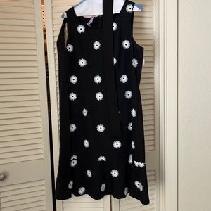 Black with white starbursts Talbot size 10 Petite. Have a peplum hem.